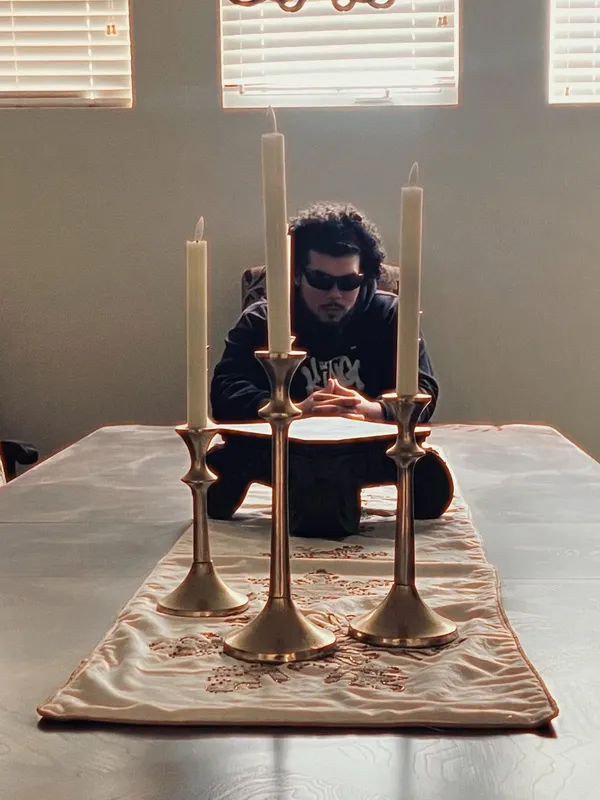 At the table, candles lit