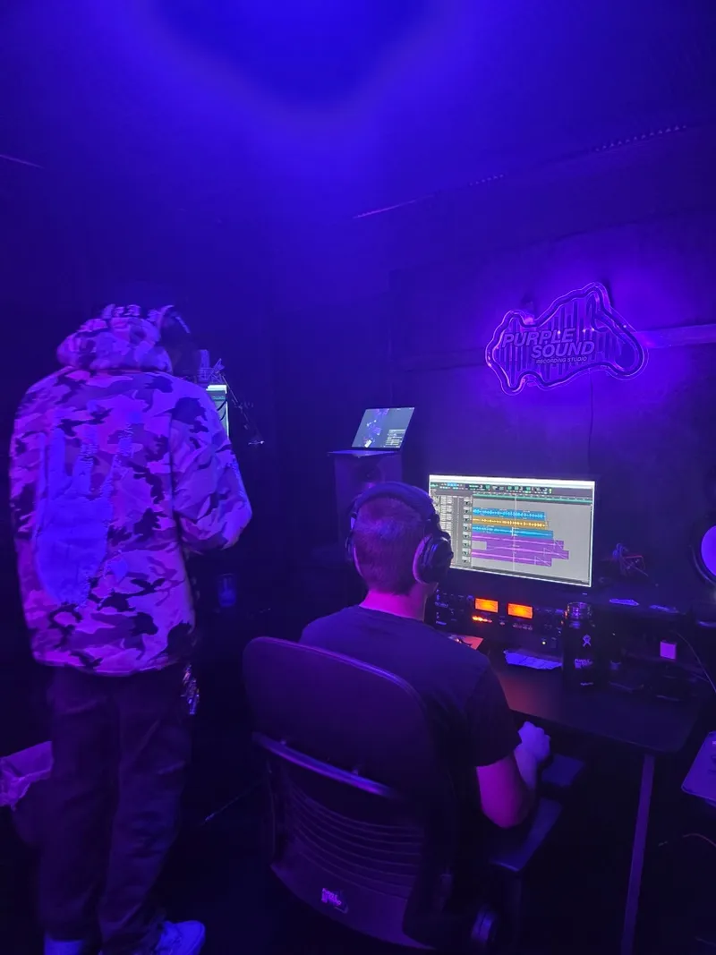 Close on the desk, the screen lit