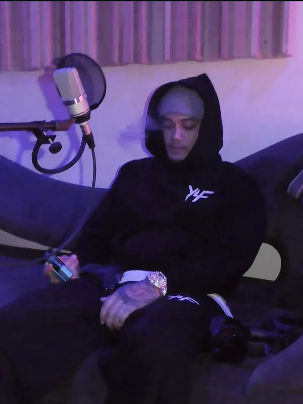 On the couch at the mic