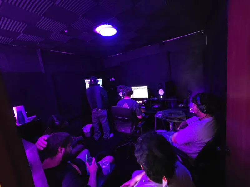 From the back of the room — every chair taken