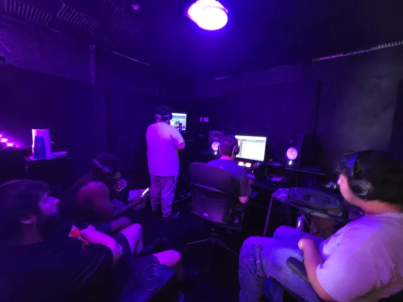 The room watching the screens from the back